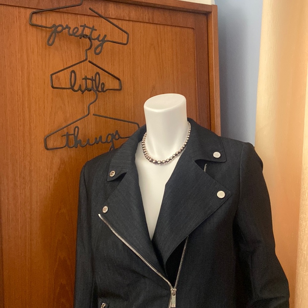 Calvin Klein motorcycle style jacket. Polyester, rayon, spandex blend.